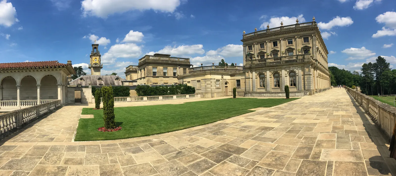 Cliveden House terrace, hotel façade and clock tower in Taplow, Berkshire