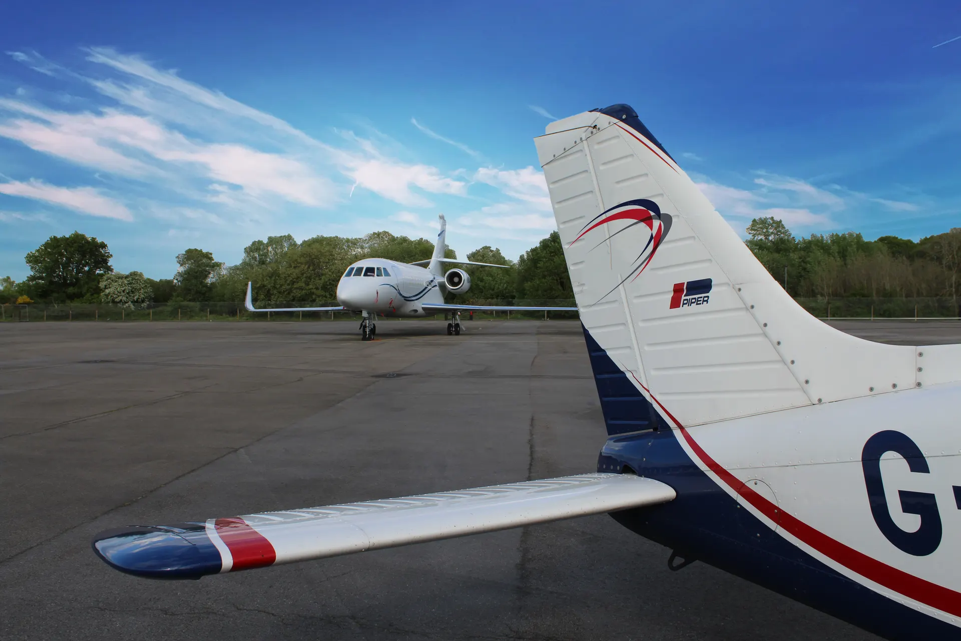 Private aircraft on the apron at Blackbushe Airport, photographed in 2018