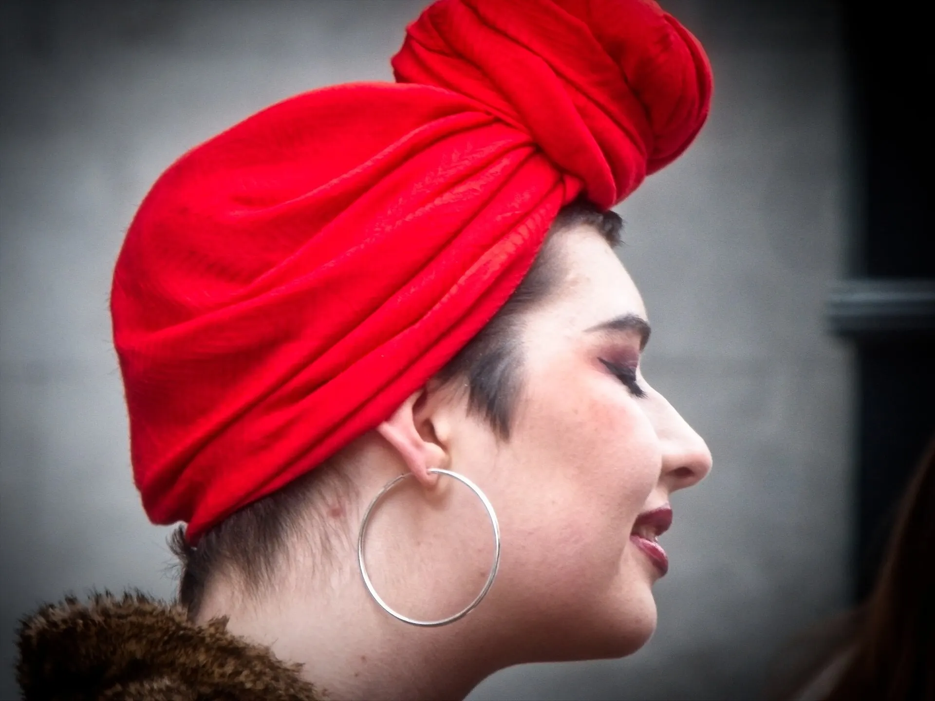 Red headwear photographed at London Fashion Week in 2018