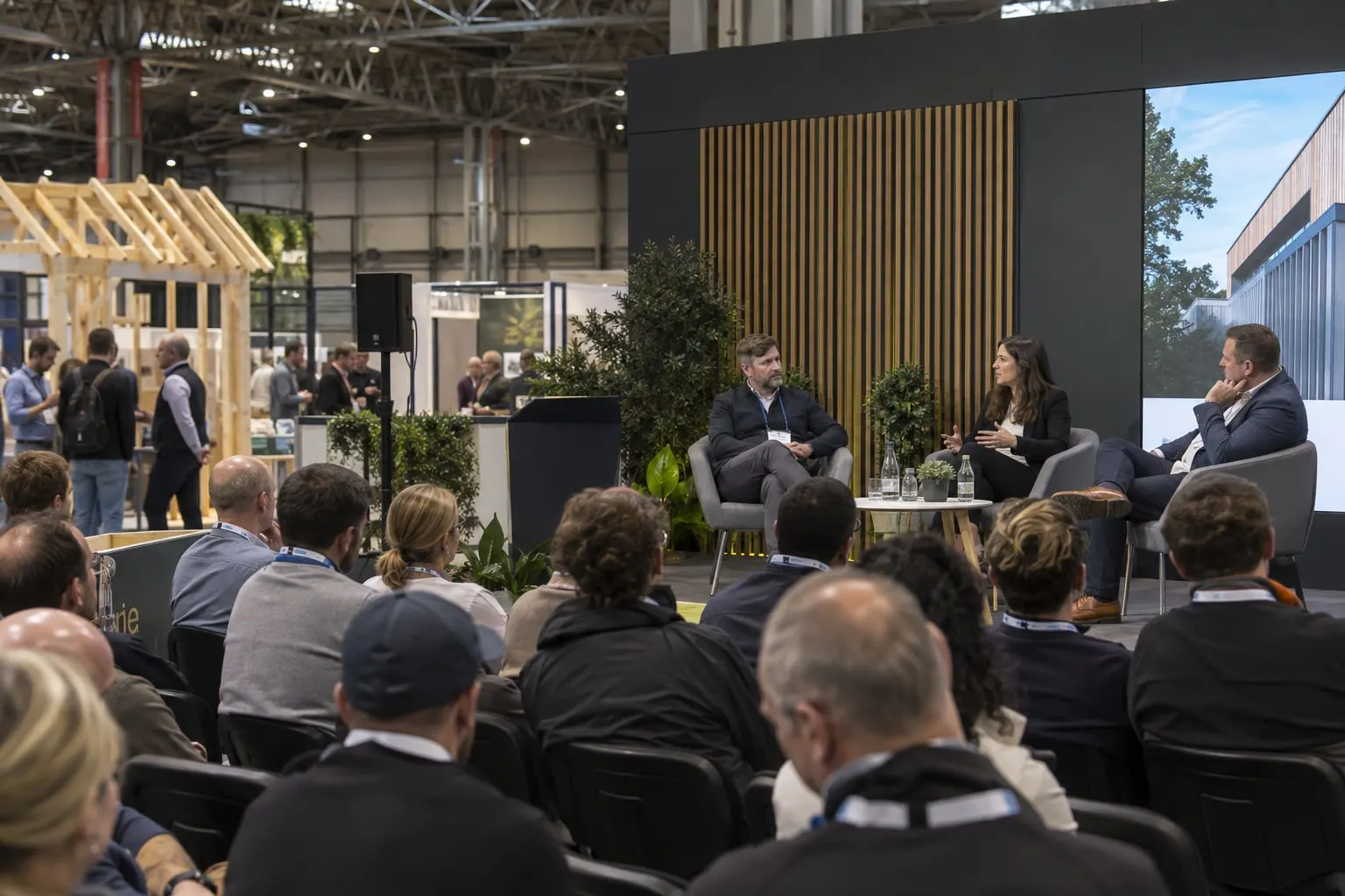 Illustrative construction project discussion at an exhibition stage