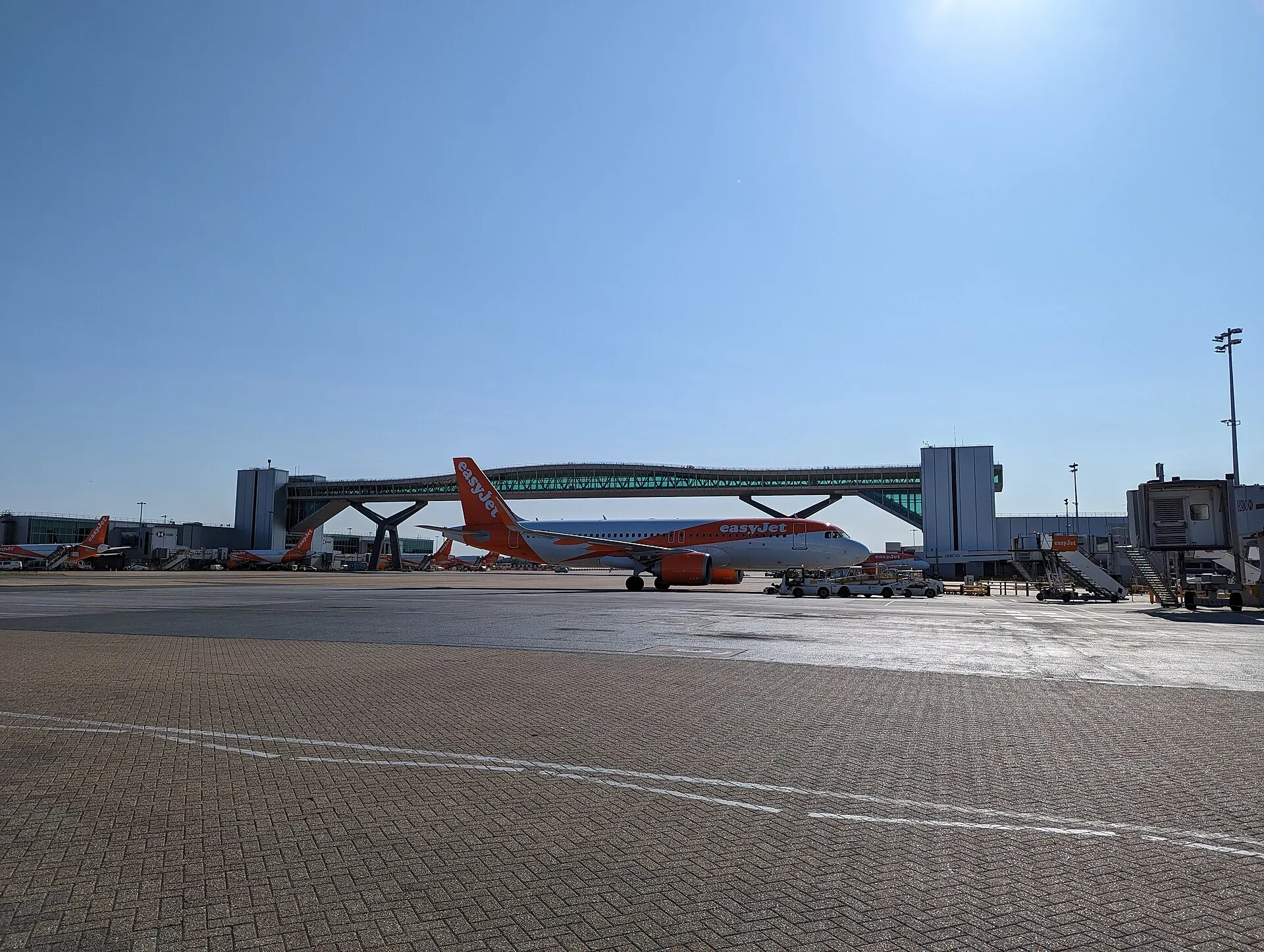 Gatwick North Terminal apron and elevated passenger bridge photographed in June 2023; not vehicle wayfinding
