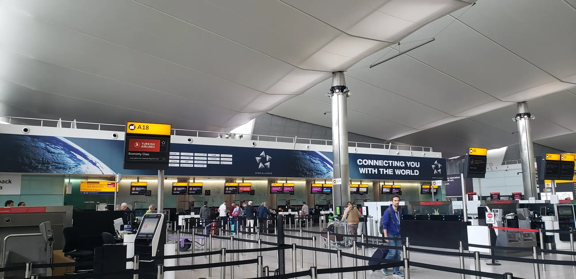 Public departures check-in hall inside Heathrow Airport Terminal 2