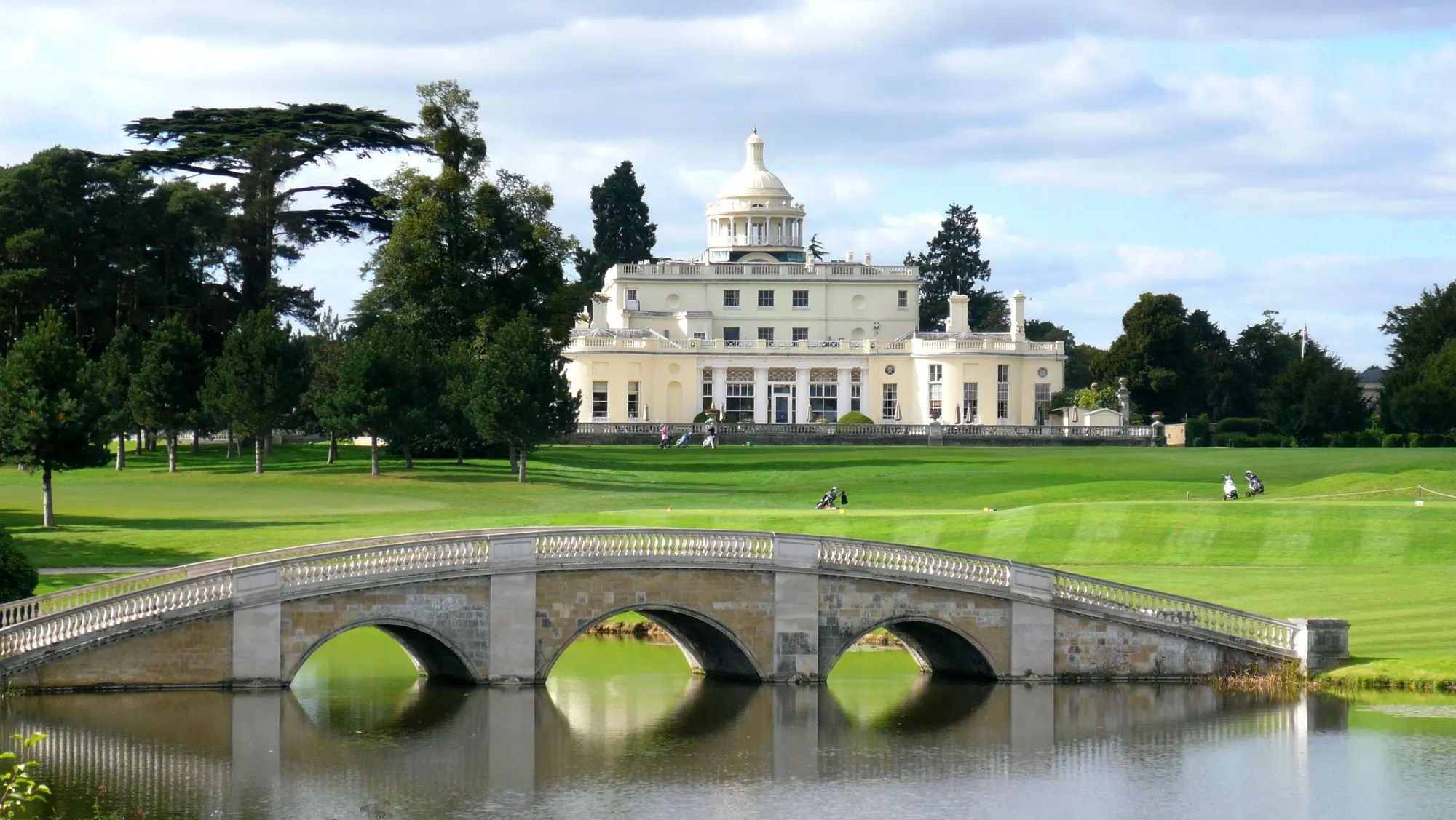 Repton Bridge and the domed mansion at Stoke Park photographed in 2017