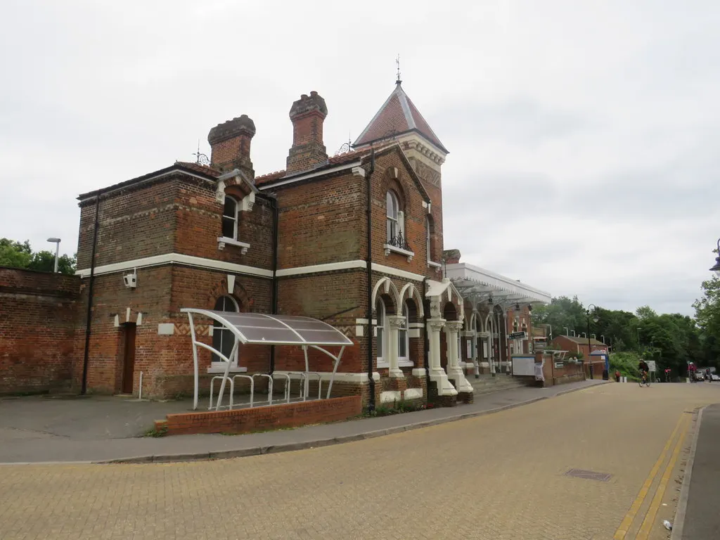 Brick frontage of Leatherhead railway station in July 2019