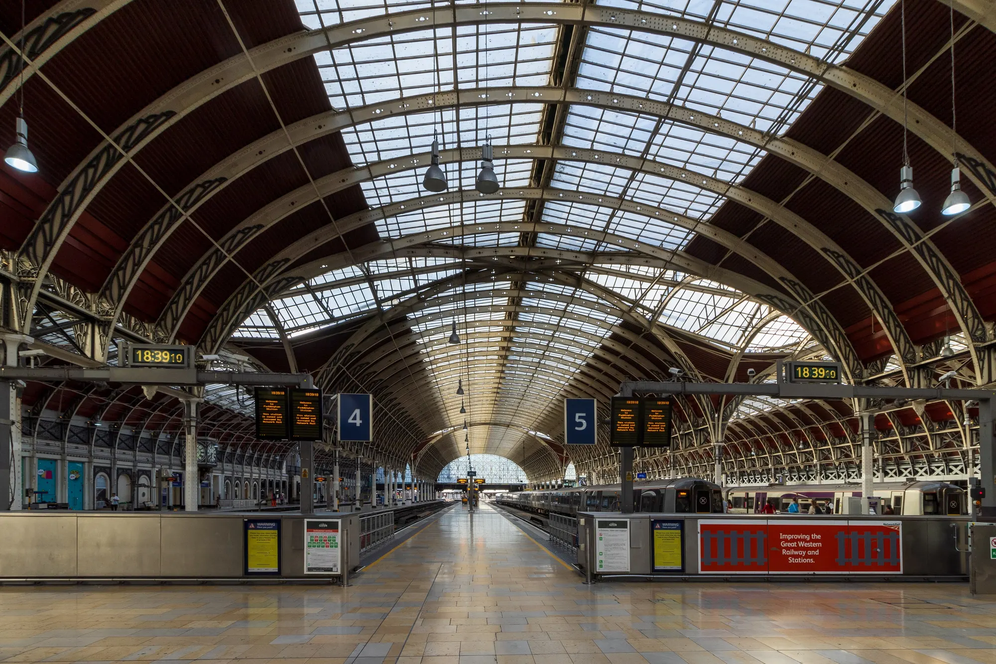 The arched train shed and platforms inside London Paddington station