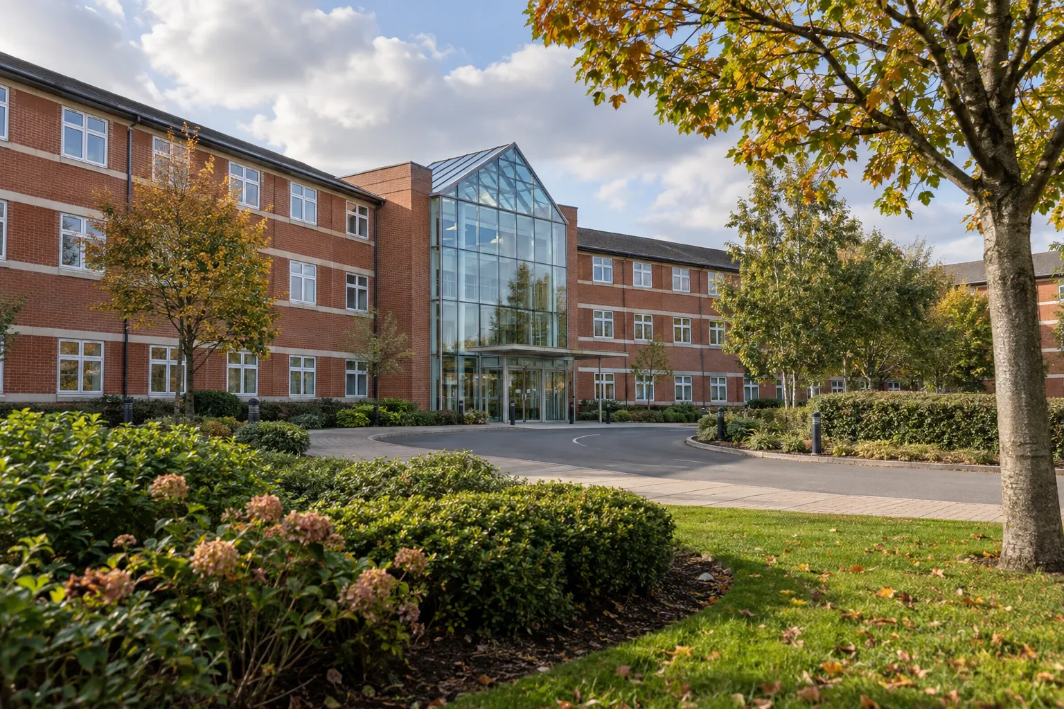 Illustrative glass atrium and red-brick wings at Windsor's Princess Margaret Hospital