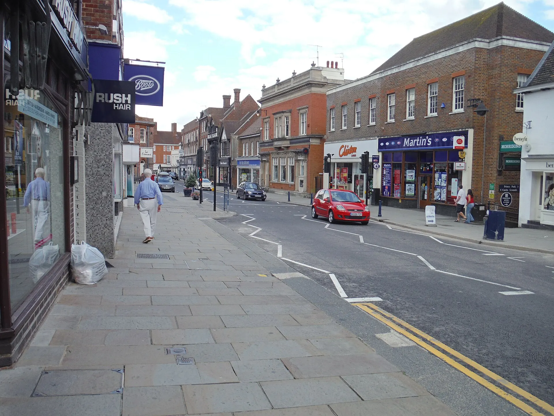 Shopfronts along Reigate High Street in July 2014