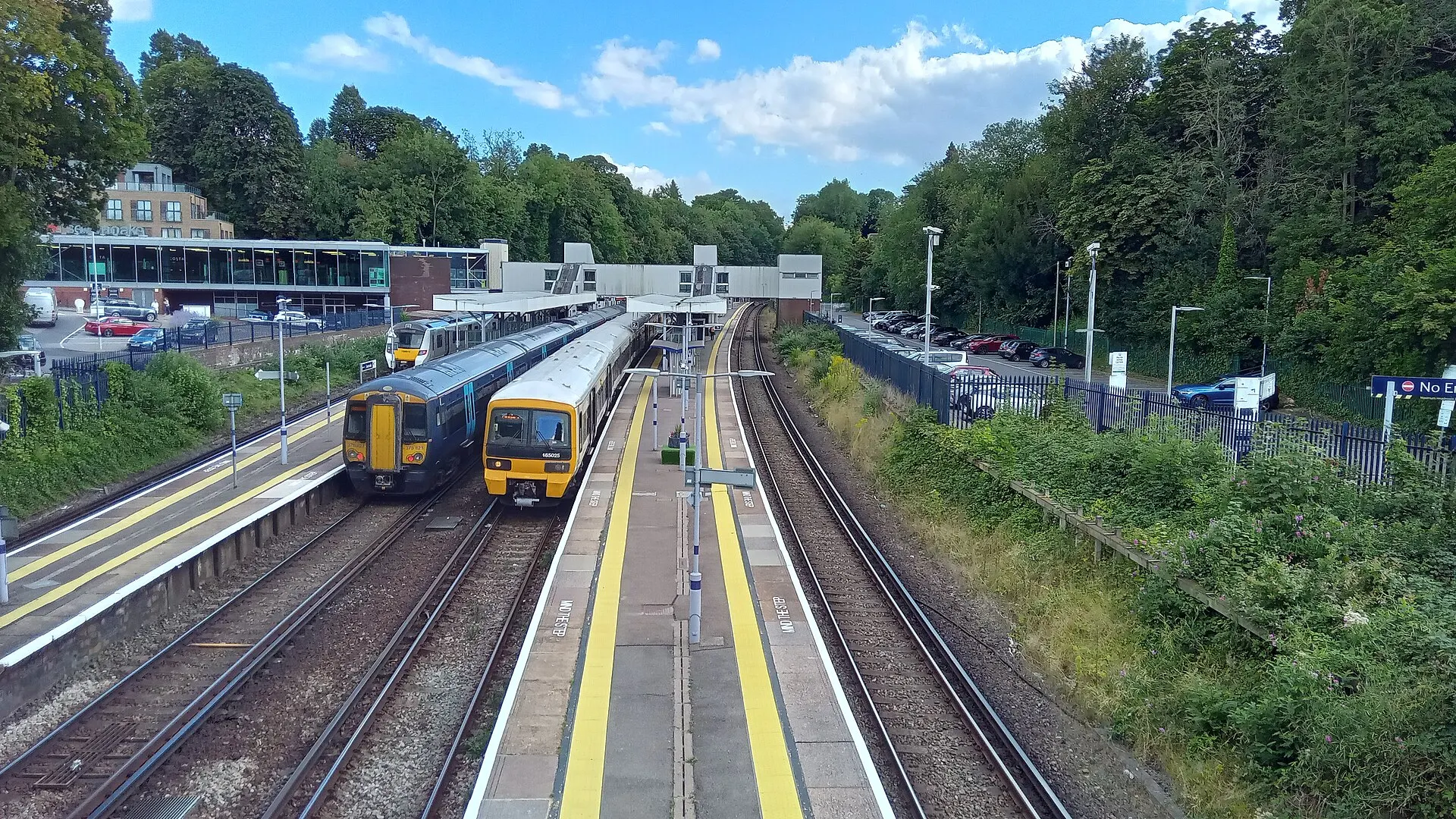 Platforms and trains at Sevenoaks railway station in August 2023