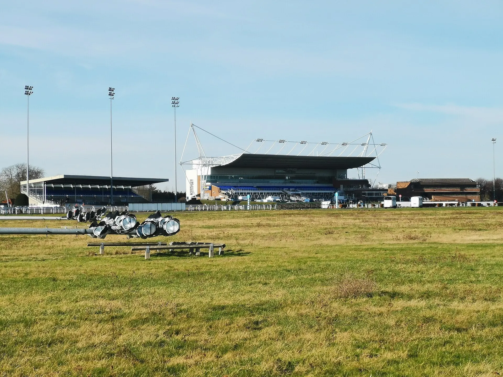 Kempton Park Racecourse's distinctive white-roofed grandstand photographed in 2019