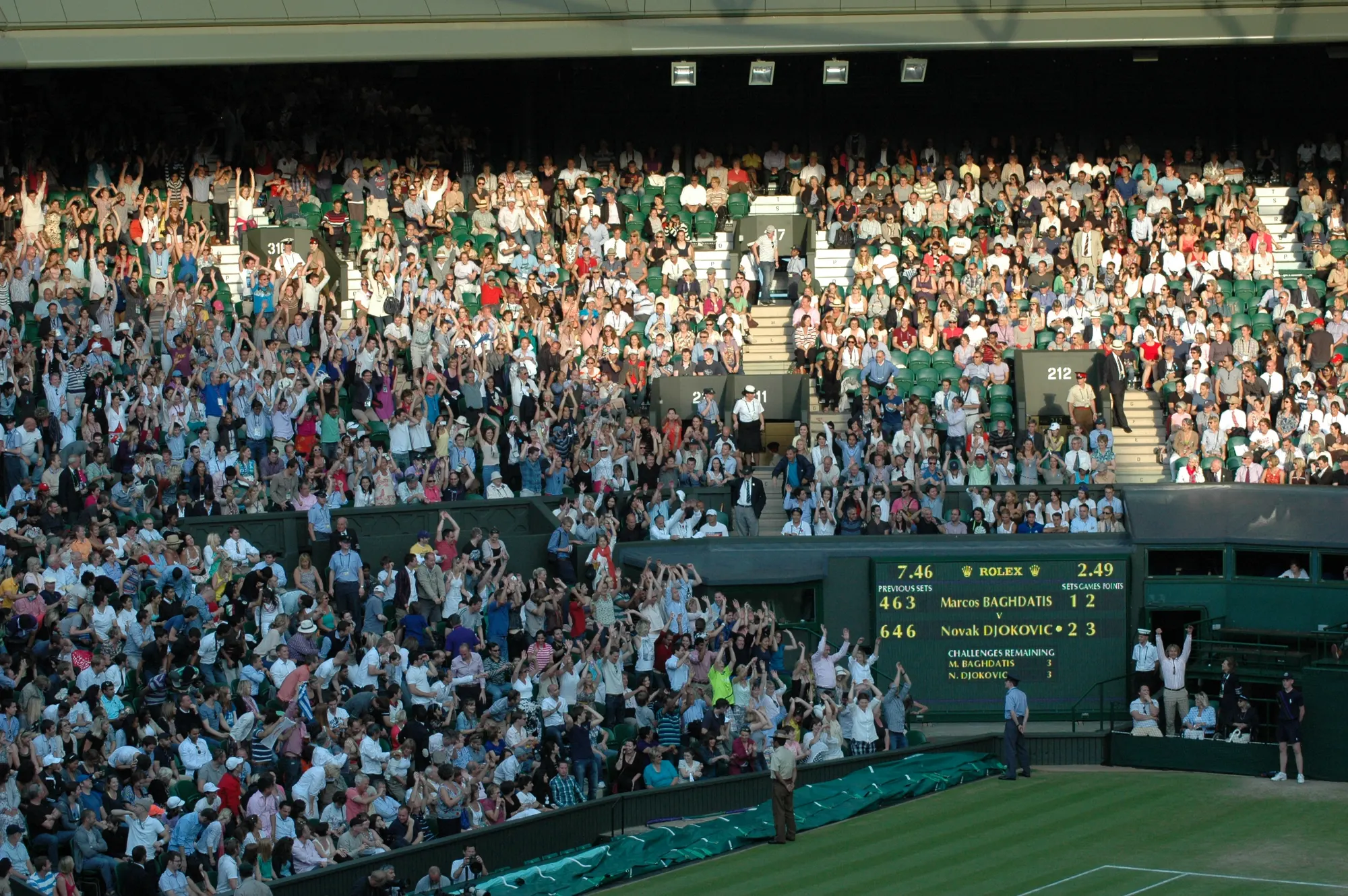 Spectators filling Centre Court at Wimbledon